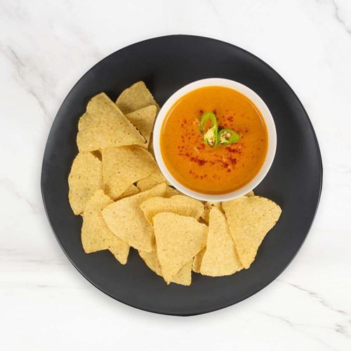 Picture of Crispy Tortilla Chips with Queso Dip (Veg)